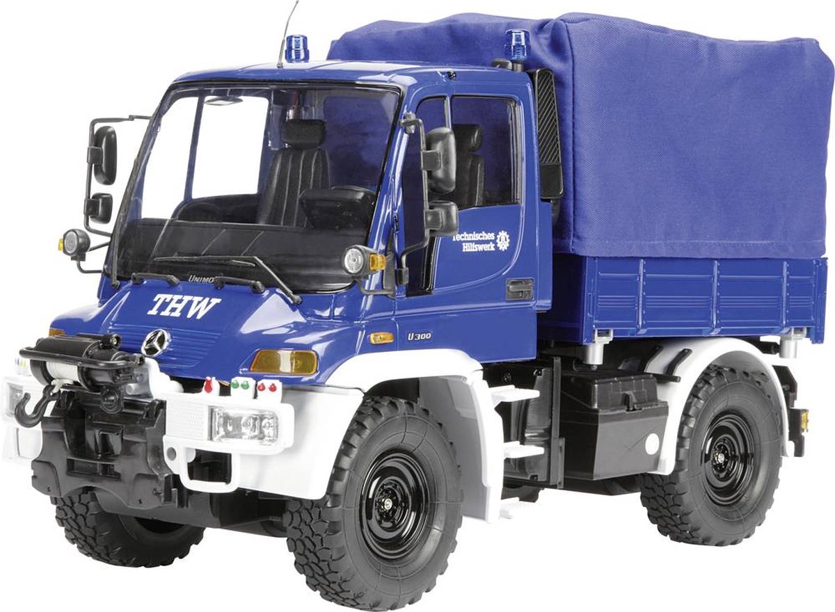 Carson Modellsport MB Unimog U300 THW 1:12 RC auto Elektro Hulpdienstvoertuig 100% RTR 2,4 GHz Incl. accu, oplader en batterijen voor de zender