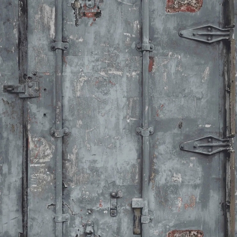 Dutch Wallcoverings Exposed Warehouse Vliesbehang Deur Grijs EW3202