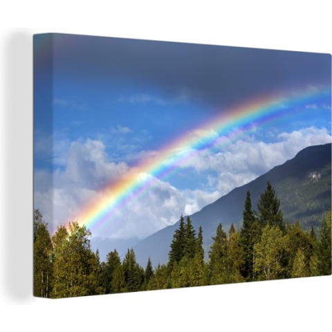 Canvas Schilderij Een duidelijke regenboog over de bergen - 120x80 cm - Wanddecoratie