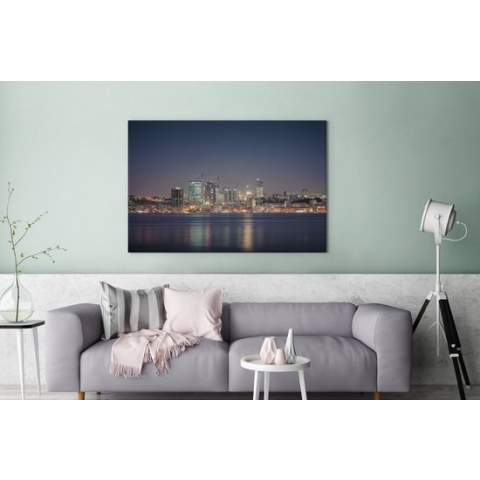 Canvas Schilderij Het Angolese Luanda in Afrika tijdens de schemering - 120x80 cm - Wanddecoratie