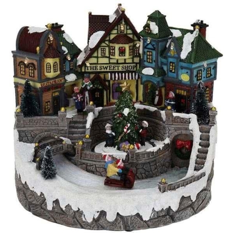 Kerstdorp met verlichting en beweging
