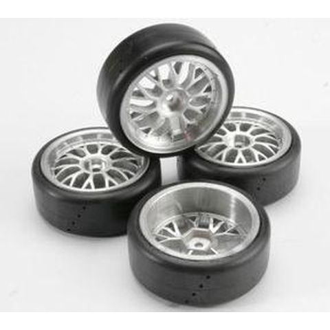 Tires, pro-trax directional on-road (medium compound with contoured inserts) (mounted and glued to part #4872 wheels) (2 left, 2 right)