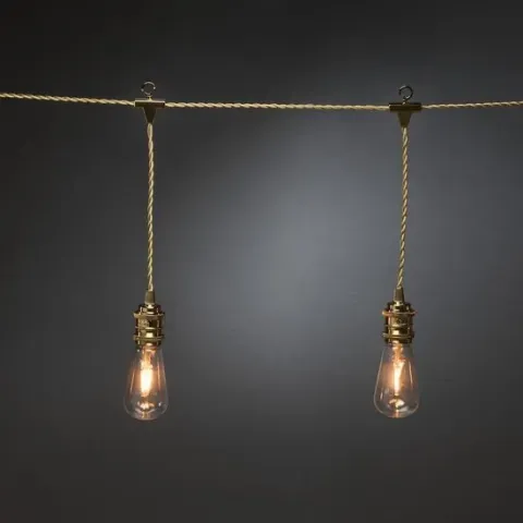 Konstsmide® Sweden 2363-800 - Snoerverlichting - Premium 8 lamps feestverlichting met verwisselbare en dimbare PowerLED - zeer energiezuinig - 350 cm - 24V – 4traps dimmer - voor binnen - extra warmwit